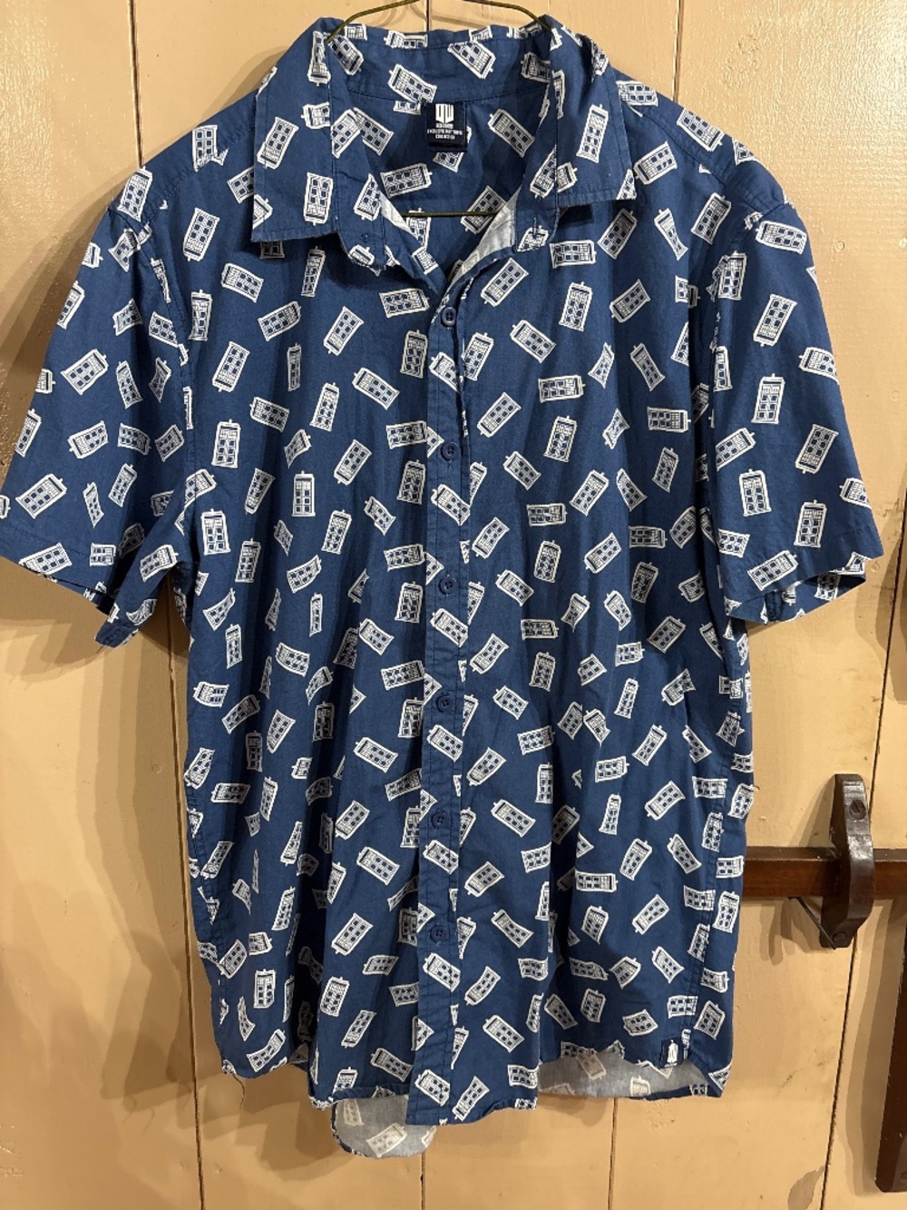 Hot Topic exclusive Doctor Who TARDIS print shirt featuring a blue and white pat